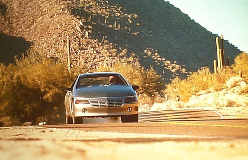1990_Cadillac_Aurora_Promo_Folder_15-fv_road